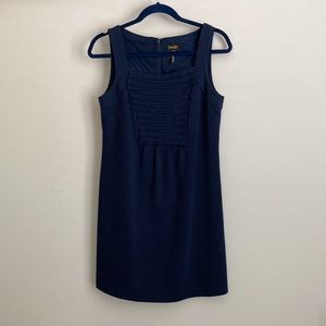 Sleeveless beautiful detail, fully lined, measures 32” shoulder to hem